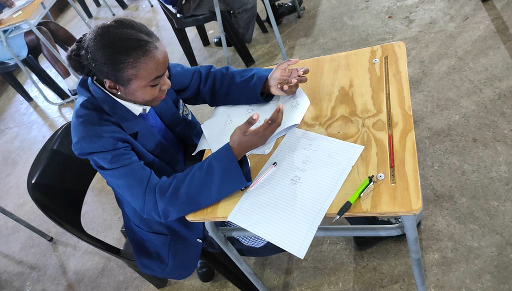 A student in an exam hall.
